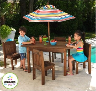 Table & Stacking Chairs w/ striped umbrella